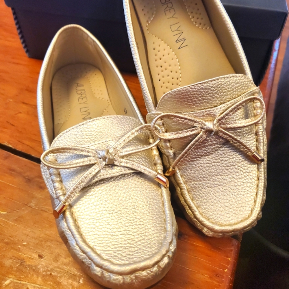 Slip-on Loafers by Aubrey Lynn. GOLD